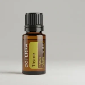 Tymianek doTERRA na szarym tle – ujęcie produktowe