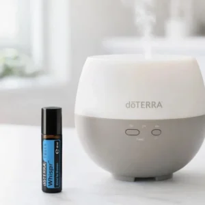 Whisper Touch doTERRA obok dyfuzora aromaterapeutycznego doTERRA