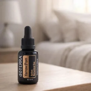 Yarrow Pom doTERRA obok dyfuzora aromaterapeutycznego doTERRA