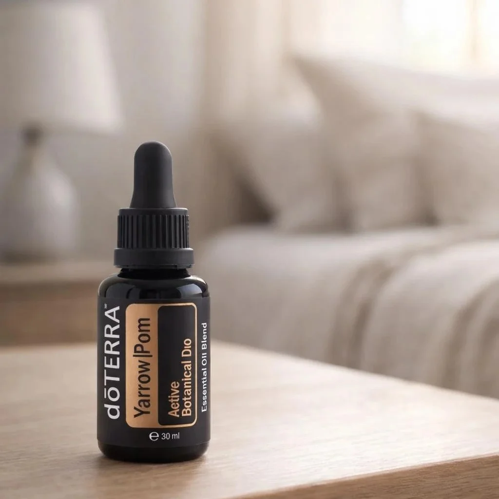 Yarrow Pom doTERRA obok dyfuzora aromaterapeutycznego doTERRA