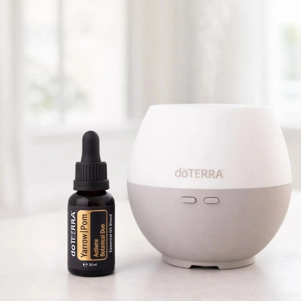 Yarrow Pom doTERRA na białym blacie kuchennym